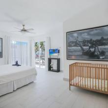 2nd floor bedroom with King bed, pool view and ensuite bathroom