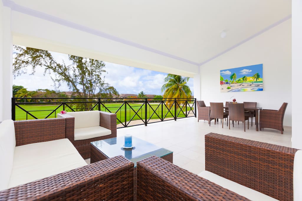 Huge fully furnished balcony overlooking the golf course. Imagine ... you can enjoy this view every day. Imagine you're sipping your morning coffee, overlooking your family and friends in the swimming pool.  This charming environment makes you feel like at home. Unbelievable peace of mind. Charming, beautiful nature around...  