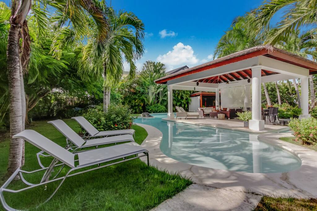 Poolside sun loungers at Villa Wyss