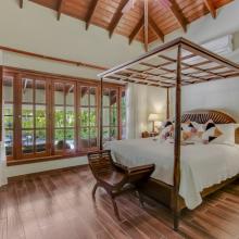 Villa Wyss: Primary bedroom with a canopy King bed