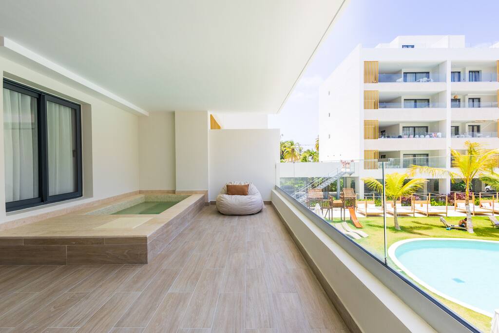 Spacious pool-view terrace for outdoor living.