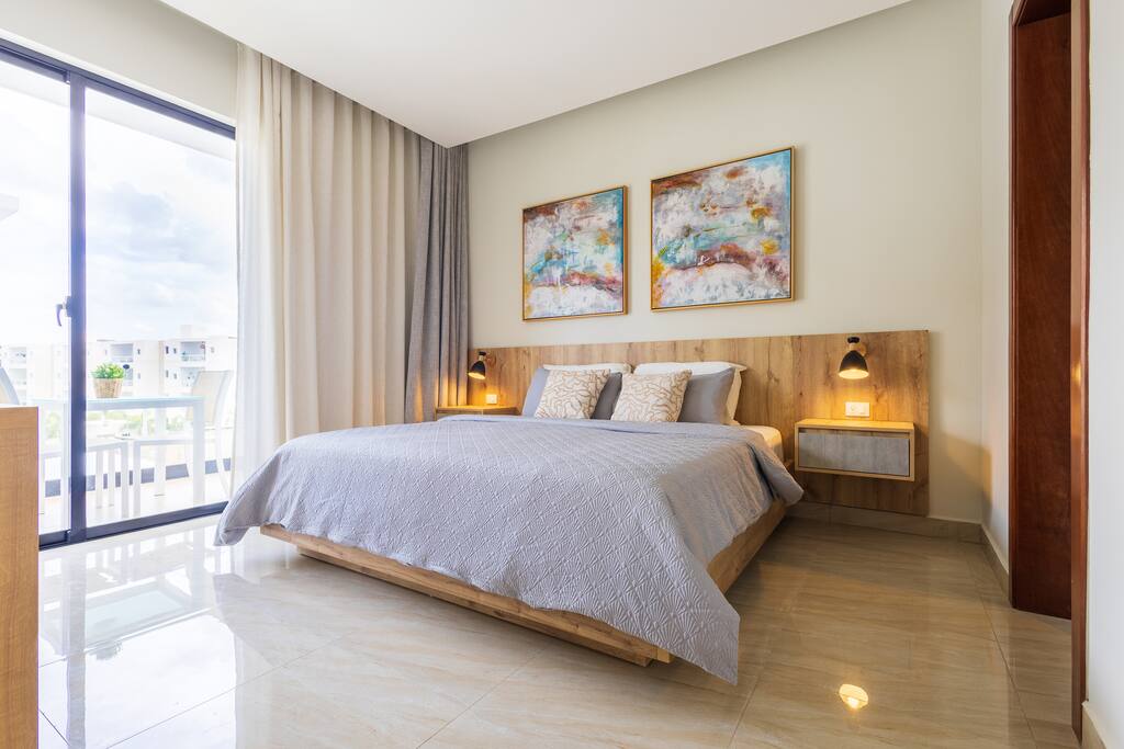 Two stylish bedrooms with queen-size beds and fresh linens.