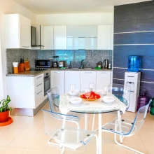 A cozy modern kitchen with all the necessary utensils. Enjoy cooking or book chef's services! Ask me how;-)