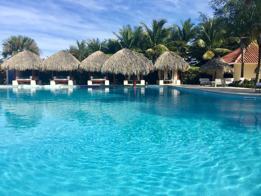 Just imagine your vacation in Punta Cana: a perfect big pool accomplished with a lounge zone under the sunshade, the open bar, and all this is set right next to your apartment!