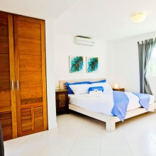 Feel at home in the bedroom with a big wardrobe, air conditioner and en-suite bathroom.