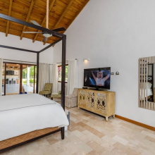 Spacious and airy bedroom with a giant bed & fresh linens for your sweet dreams