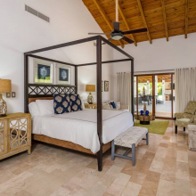 Spacious and airy bedroom with a giant bed & fresh linens for your sweet dreams