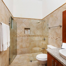 Clean and sanitized bathroom with fresh and clean towels.