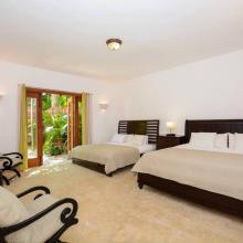 Enjoy a peaceful night's sleep in one of the villa's comfortable bedrooms.