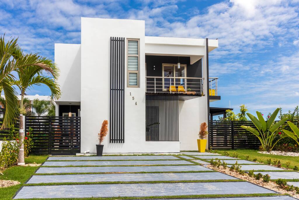 Welcome to your cozy haven, a 4-bedroom modern villa in a safe gated community in Punta Cana.