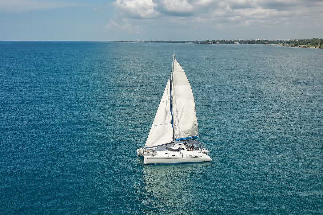 Happy Wind Catamaran Cruise in Punta Cana – Private Trip for Up to 14 Guests to the Top Dominican Republic Destinations - Everything Punta Cana