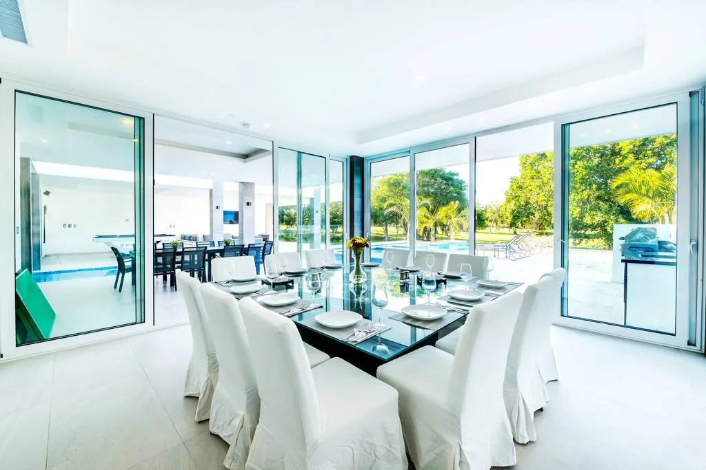 The light-colored dining room is perfect for any meal.