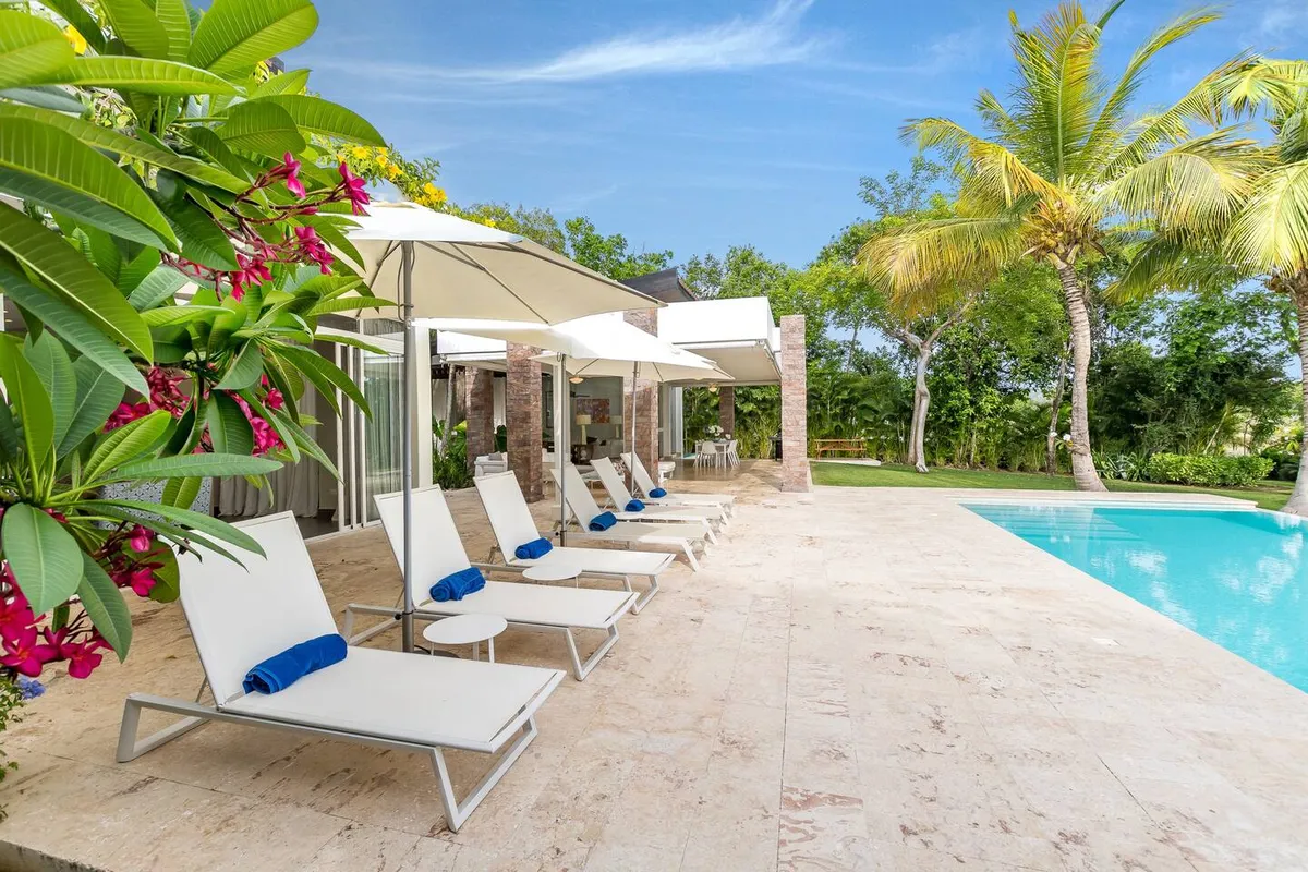 Pool, sun loungers and terrace