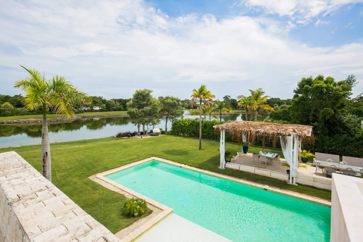 Lake, pool and garden view from the villa