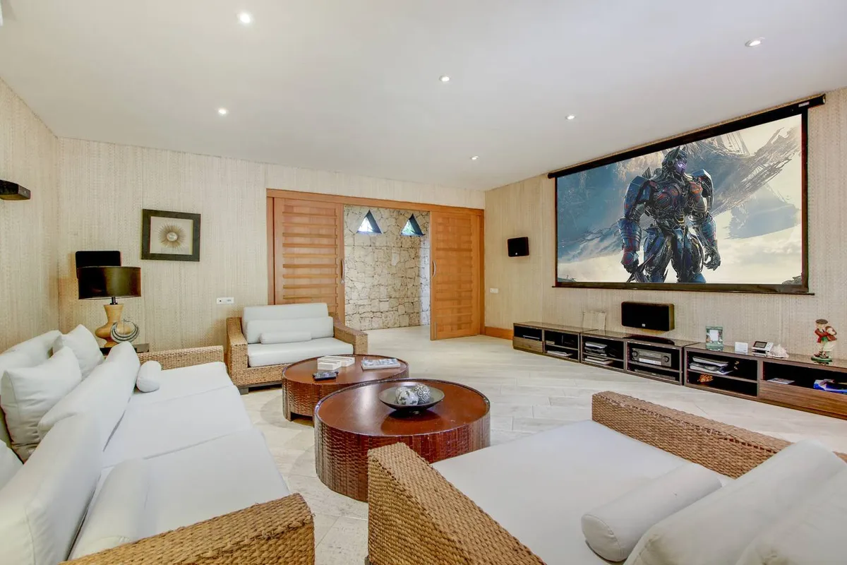 Living room with a home cinema at the villa