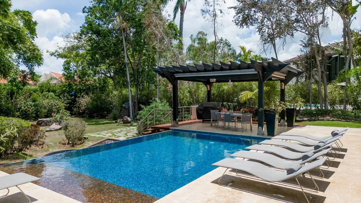 Pool in the villa with sun loungers