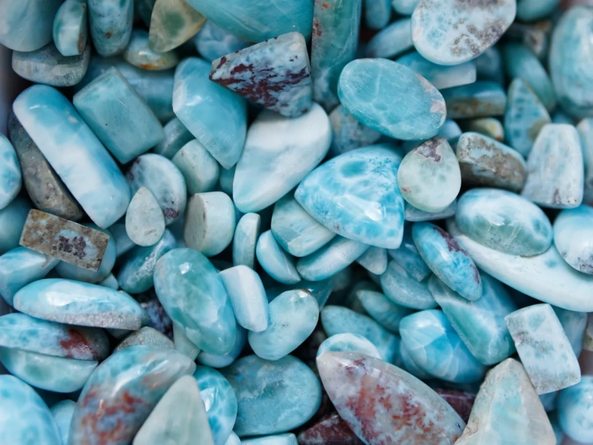 A scattering of larimar stones Authentic Larimar stones - a great idea of what to bring from the Dominican Republic